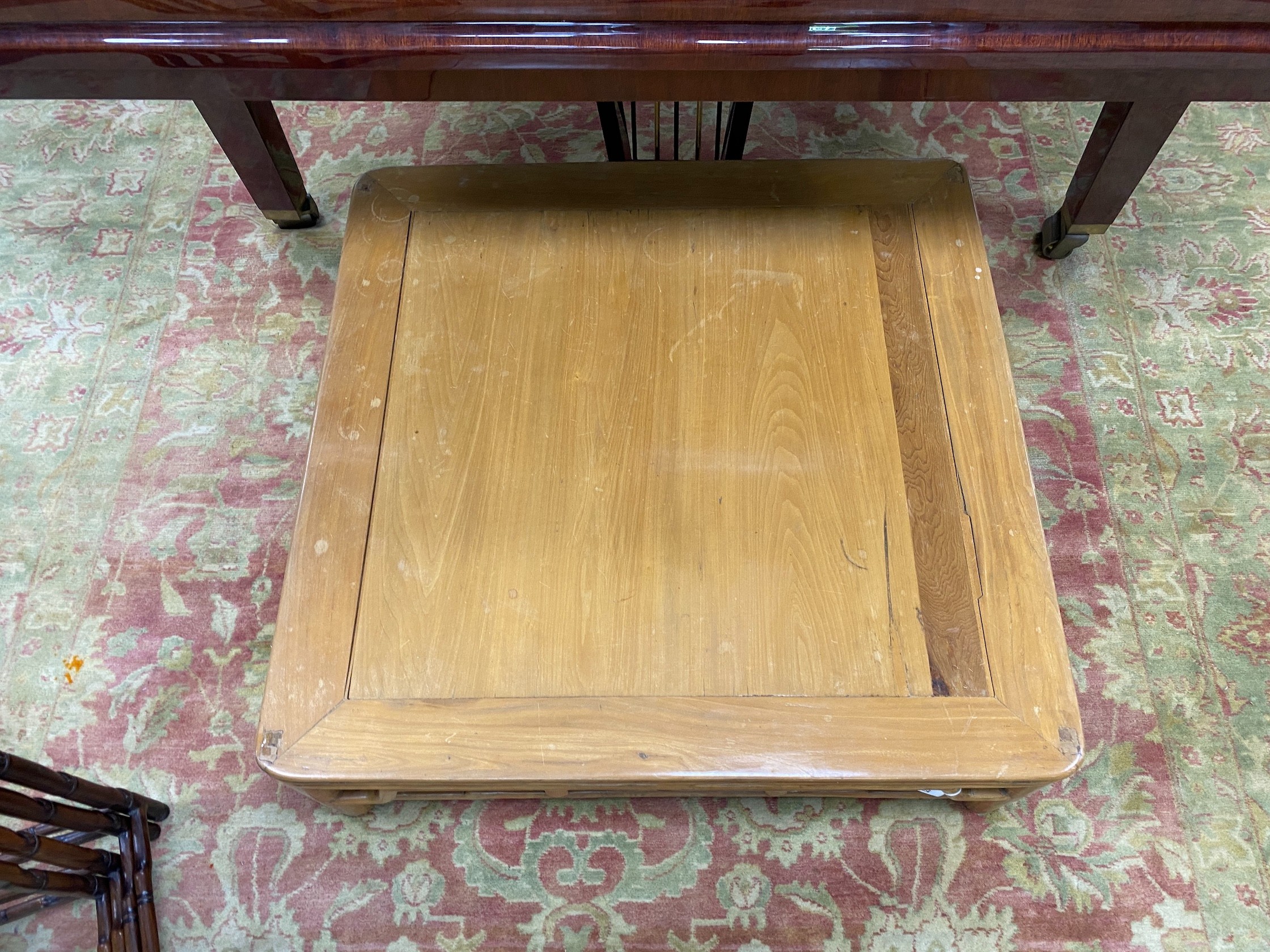A Chinese square elm low table, length 88cm, height 28cm